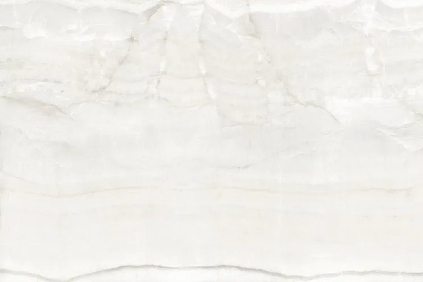 A white marble background with a large amount of paper.