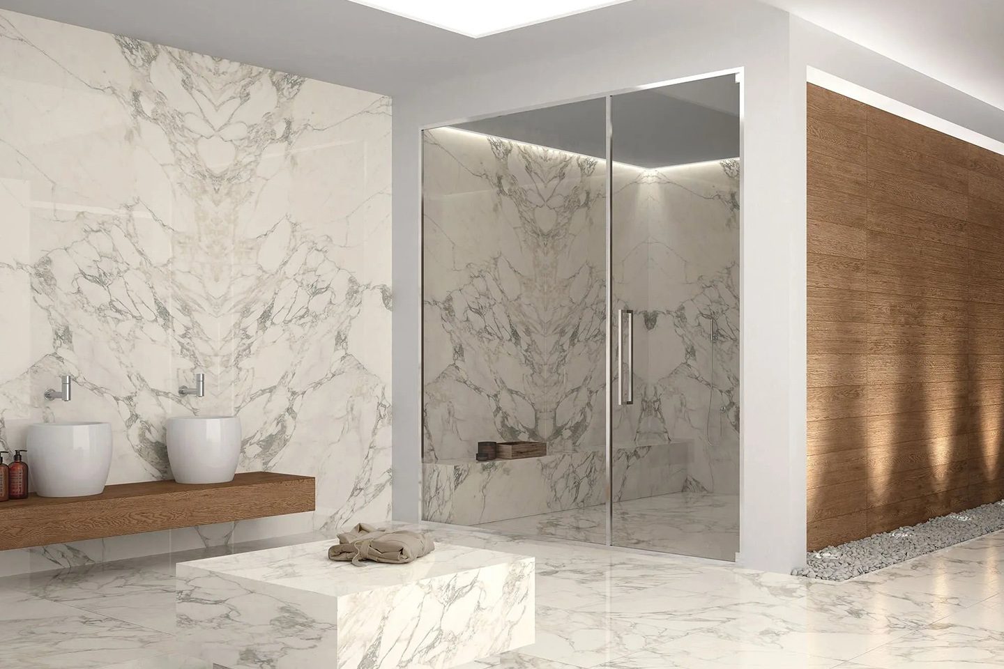 A bathroom with marble walls and floors